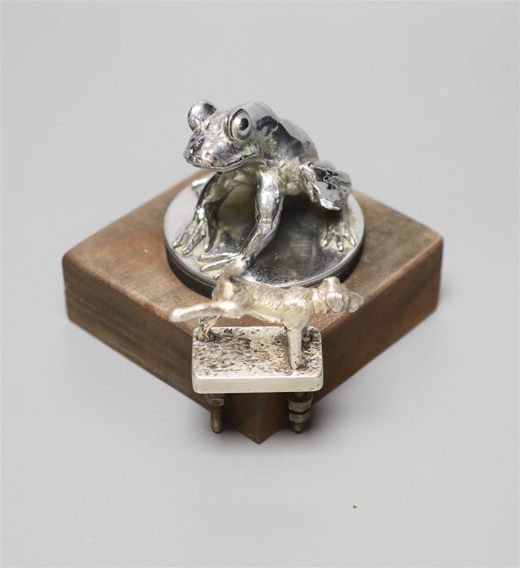 An unusual novelty 20th century chrome car mascot in the form of a urinating terrier, stamped Lejeune, made in England to underside,